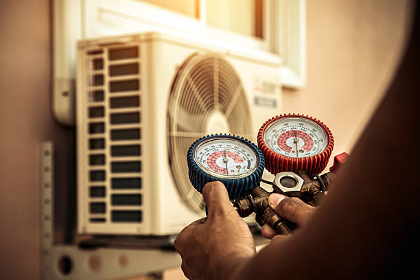 Professional Ductwork Repair technician working in Belford, NJ